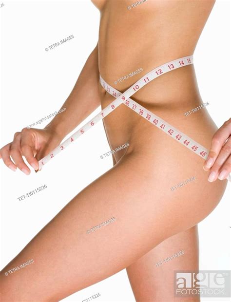Nude Female Measuring Her Waist Stock Photo Picture And Royalty Free