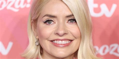 Holly Willoughby Wears Yellow Floral Midi Dress