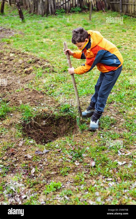 Digging A Hole Boy High Resolution Stock Photography And Images Alamy