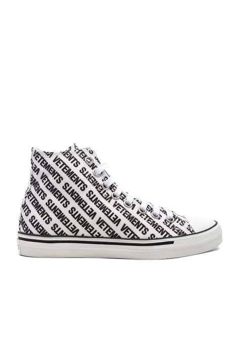 Vetements Printed Canvas High Top Sneakers In White And Black Fwrd