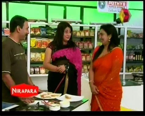 Lakshmi Nair And Sona Nair Hot Navel Show In Saree From Kairali Tv