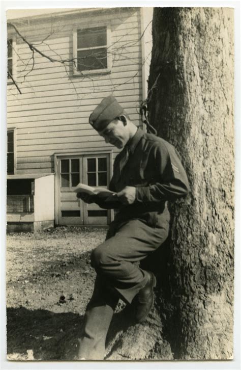 [Photograph of Soldier Reading Letter] - Side 1 of 2 - The Portal to