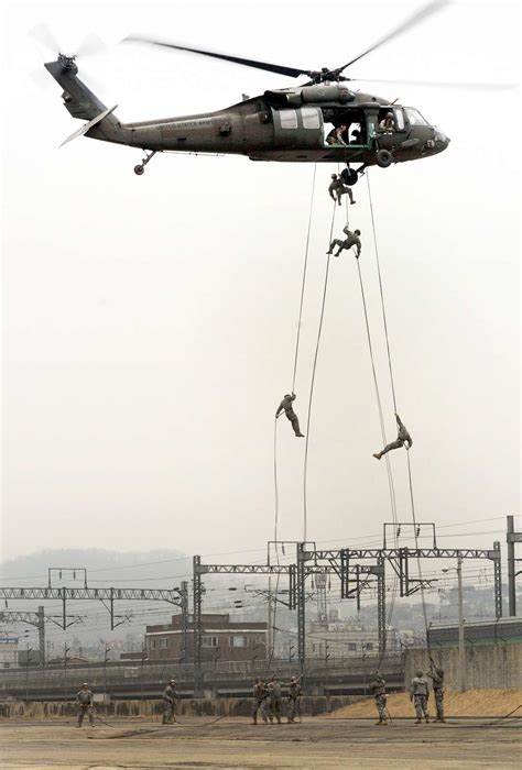 Us Soldiers Rappel From A Uh 60 Black Hawk Helicopter Nara And Dvids