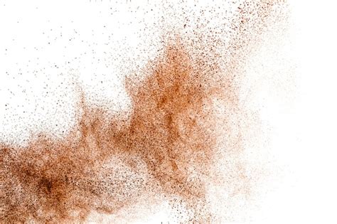 Premium Photo Freeze Motion Of Brown Powder Exploding Abstract