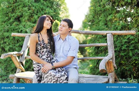 Young Happy Couple Sitting In Summer Park Stock Image Image Of Park