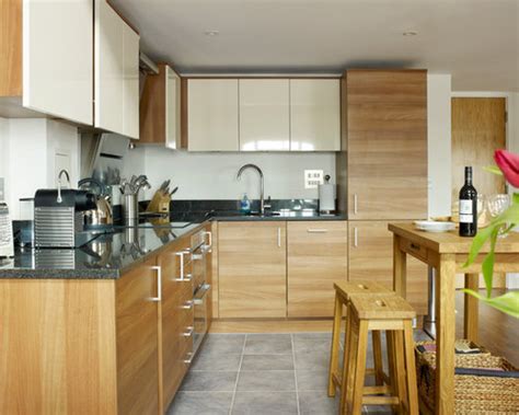 One colour for the top cabinets, an additional one for the lower cabinets, or a different colour for the cupboard doors. Laminate Wood Cabinet Home Design Ideas, Pictures, Remodel ...