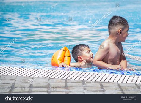 Two Boys Swimming Pool Summer Vacation Stock Photo 1128458753
