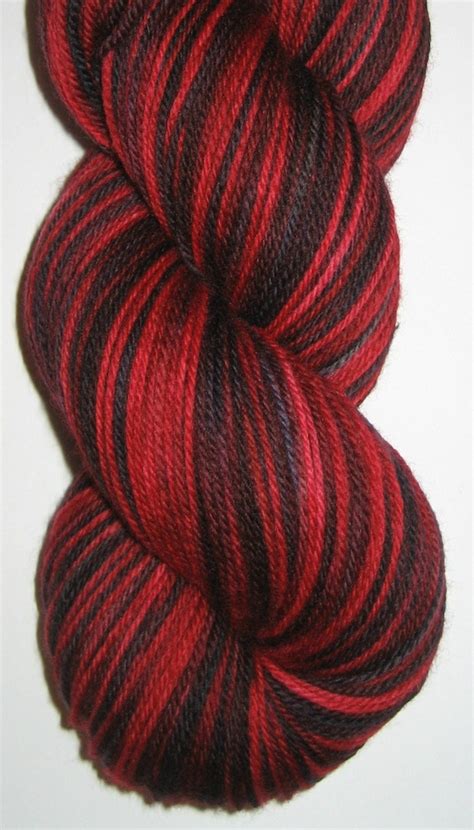 Hand Dyed Red And Black Superwash Merino Wool Sock Yarn
