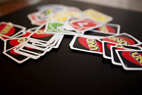 Uno is a simple game that is fun for both kids and adults. How to Play Uno in 5 Easy Steps | Bar Games 101