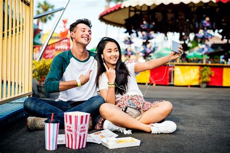 couple dating amusement park ride playful fun excitement id 4219