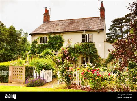 Idyllic English Country Cottage And Garden In The Cotswolds Area Stock