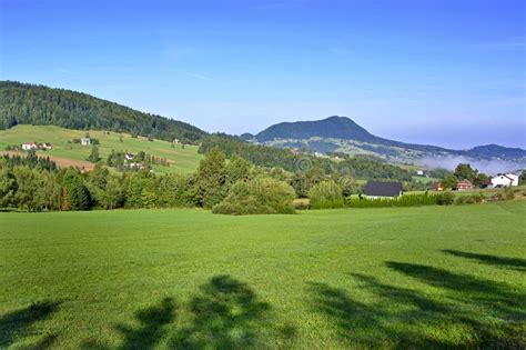 Beautiful Summer Landscape In The Mountains With Green Meadows And
