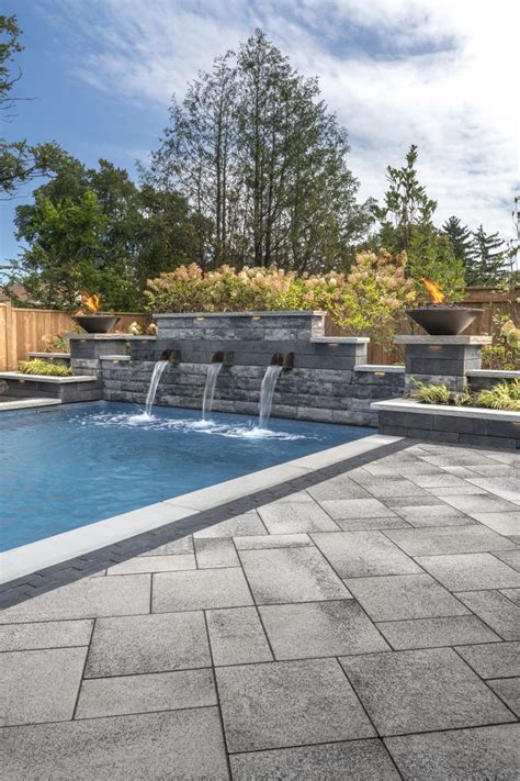 Modern Unilock Pool Deck Installed With Umbriano Paver With U Cara