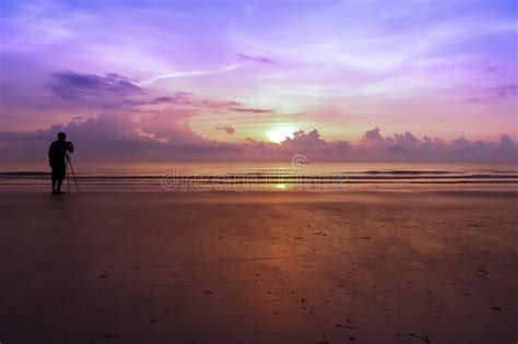 Man Photographed Sunrise Standing On The Sand Stock Photo Image Of