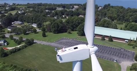 Drone Pilot Catches Monk Sunbathing On Wind Turbine Digital Trends