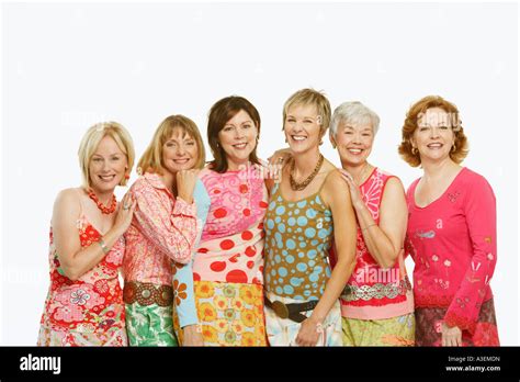 Portrait Of A Group Of Mature Women Standing And Smiling Stock Photo