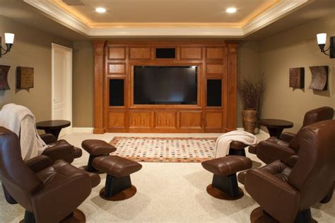 This Smaller Media Room Has Four Recliners With Ottomans Arranged In A