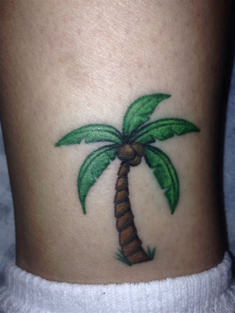 Inked mag advises to not complicate a palm tattoo with intricate designs, shading, or color palettes. Small Palm Tree Tattoo Design | Possible Tatoos ...