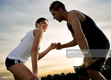Couple Bumping Into Each Other Photos Et Images De Collection Getty