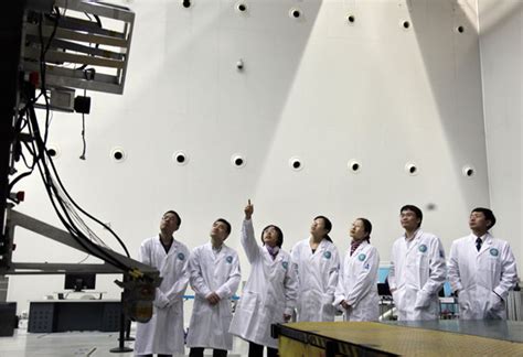 Members Of A Space Control Research Team From The China Academy Of