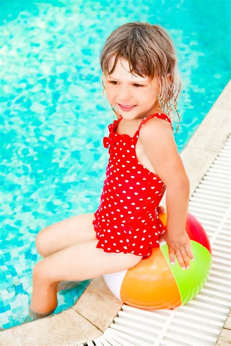 Premium Photo Happy Child On The Beach Near The Swimming Pool