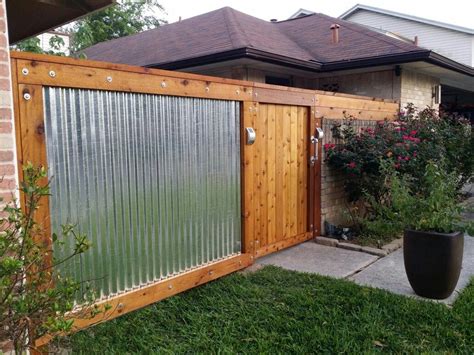 The most complicated table saw fence with incremental positioning. Rough Sawn Cedar & Galvanized Corrugated Metal Fence | Backyard fences, Diy privacy fence, Fence ...
