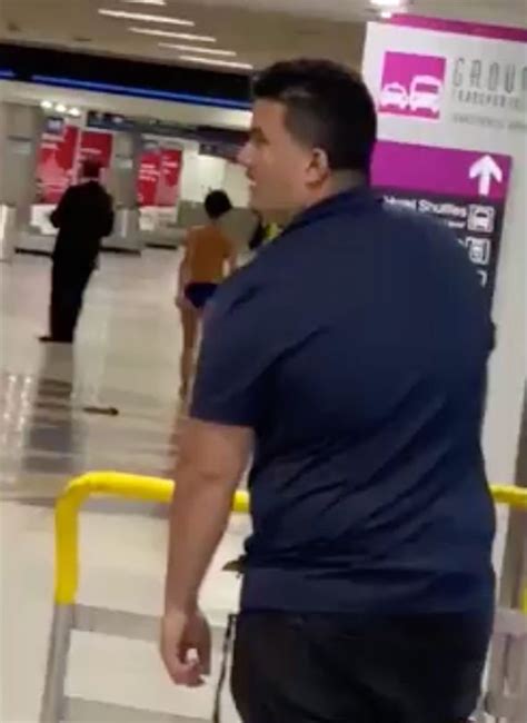 flights woman caught stripping naked at miami airport in shocking viral video travel news