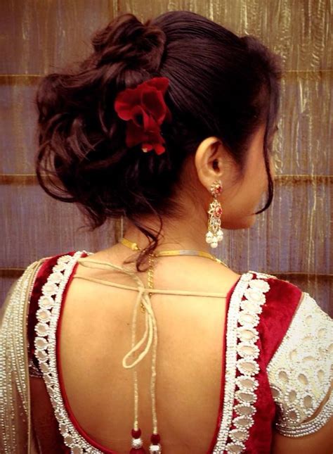 You can wear your hair down and still incorporate. Traditional South Indian bride's bridal reception ...