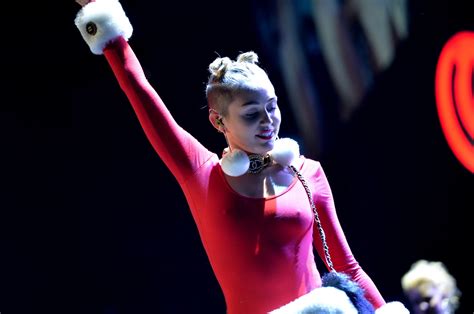 Miley Cyrus Shows Off Pokies And Ass Wearing A Red Leotard On Stage At