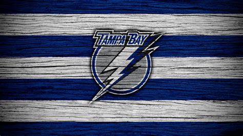 emblem logo nhl tampa bay lightning in blue and white striped background basketball 4k hd sports