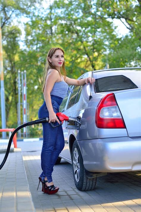 The Girl Runs The Car At The Gas Station Stock Photo Image Of Station