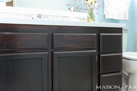 When the doors and cabinets are fully dry, paint on the new finish in long, smooth strokes, then apply a second coat after six hours of drying. DIY Gel Stain Cabinets (No heavy sanding or stripping!) - Maison de Pax