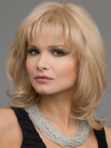 11 Sensational Medium Length Hairstyles For Round Face Women With Bangs