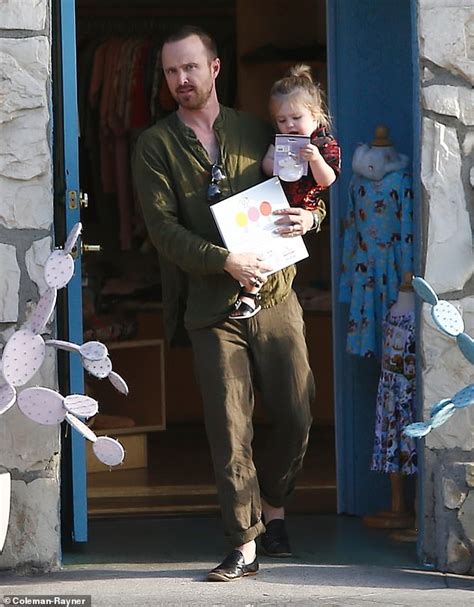 Aaron Paul Helps One Year Old Daughter Story Pull A Red Radio Flyer