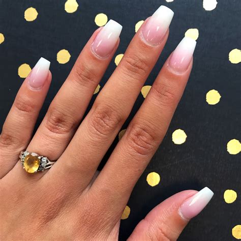 The nails in this set have ombré designs with three distinctive blends. Ombre pink and white coffin nails | Pink ombre nails ...