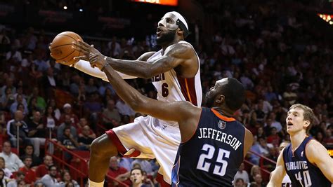 LeBron pours in career-high and Heat record 61 points