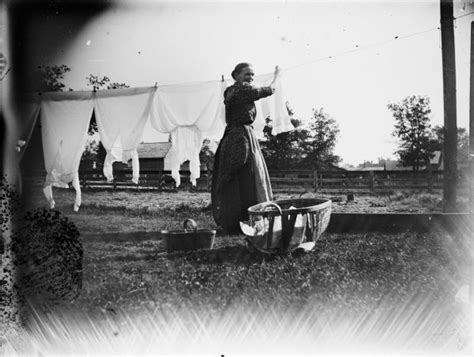 Woman Hanging Clothes On A Line Photograph Wisconsin Historical Society