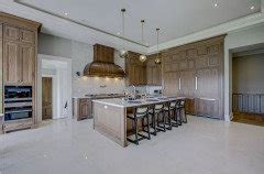 Cooktop, oven, and burner temperature issues may be resolved without a technician. Side by side under-counter wall ovens centered under cooktop?