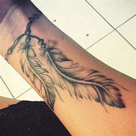 57 Attractive Wrist Feather Tattoos Wrist Tattoo Pictures
