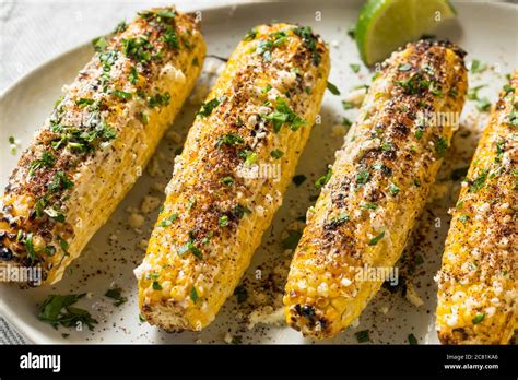 Homemade Spicy Elote Mexican Street Corn With Mayo Lime And Cheese