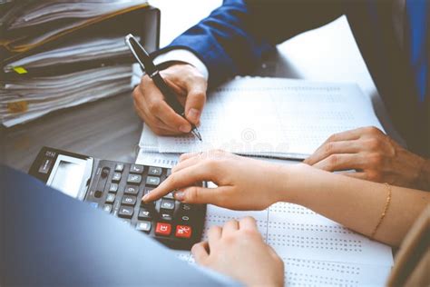 Bookkeeper Or Financial Inspector And Secretary Making Report