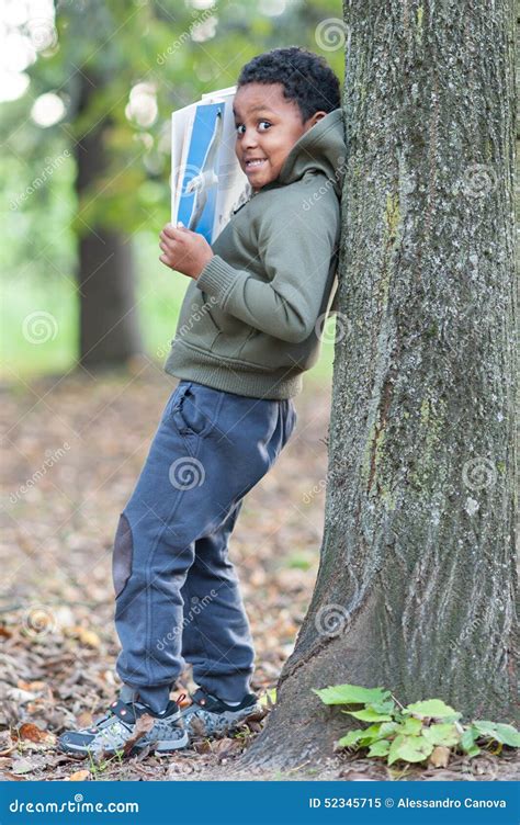 Color Baby Leaning Against A Tree Reading A Book