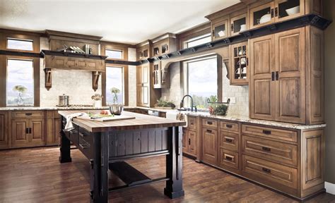 Rustic alder kitchen cabinets add to the homespun look of this space, which features an island that emulates a table filled with basket storage. 8 Images Knotty Alder Kitchen Cabinets Pictures And View ...