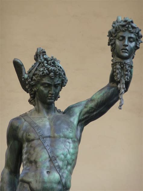 This Is A Sculpture Of Perseus Holding The Head Of Medusa One The