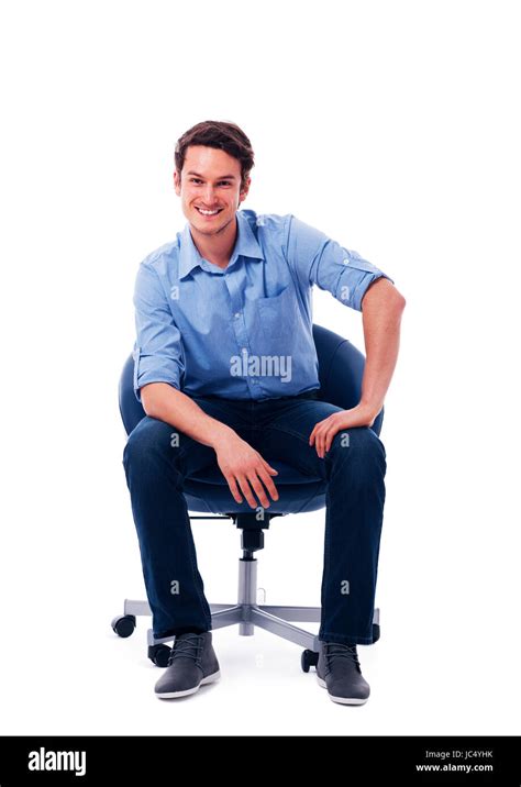 Handsome Male Sitting On Chair Stock Photo Alamy