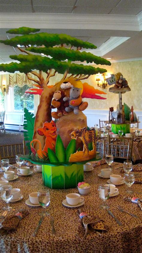 In choosing the items you love and leaving the ones that you know you can live without. lion king first birthday centerpiece | www.theshowplaceny ...