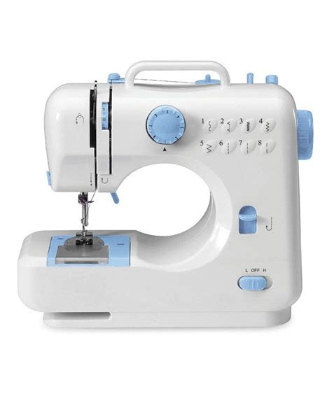 The Sewing Machine Is White And Blue