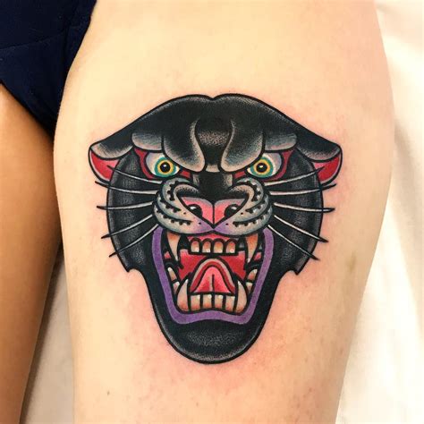 Tattoos and their meanings panthers iron brush tattoo. Angry panther tattoo on the thigh - Tattoogrid.net