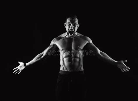 Strong Athletic Man With Naked Muscular Body Screaming Stock Image
