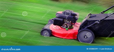 Red Lawn Mower In Lush Green Grass Mowing Lawn Stock Image Image Of